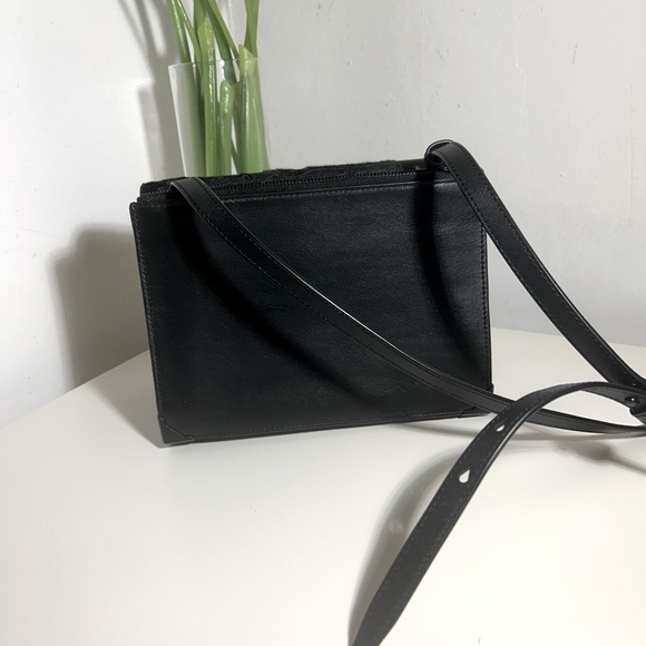 Alexander Wang
Ponyhair-Trimmed Leather Crossbody Bag - Picture 3 of 9